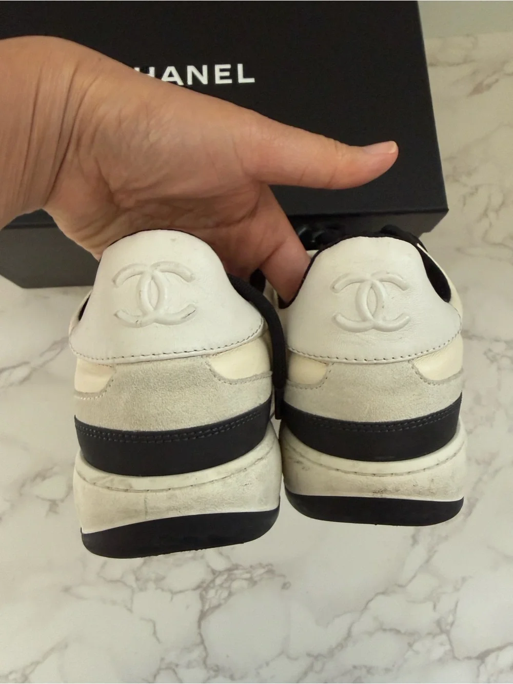 CHANEL Leather Cream and Black CC Charm Low-Top Sneakers